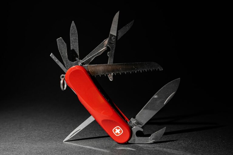 Red and silver multi tool: Swiss Army knife